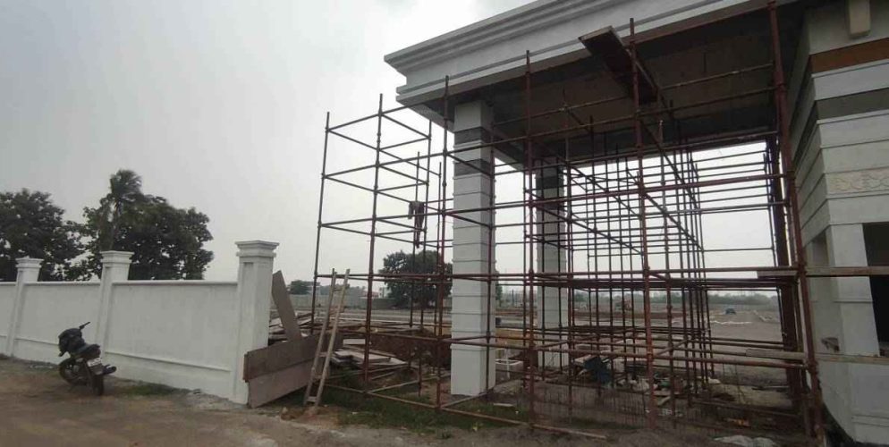 a building under construction with scaffolding